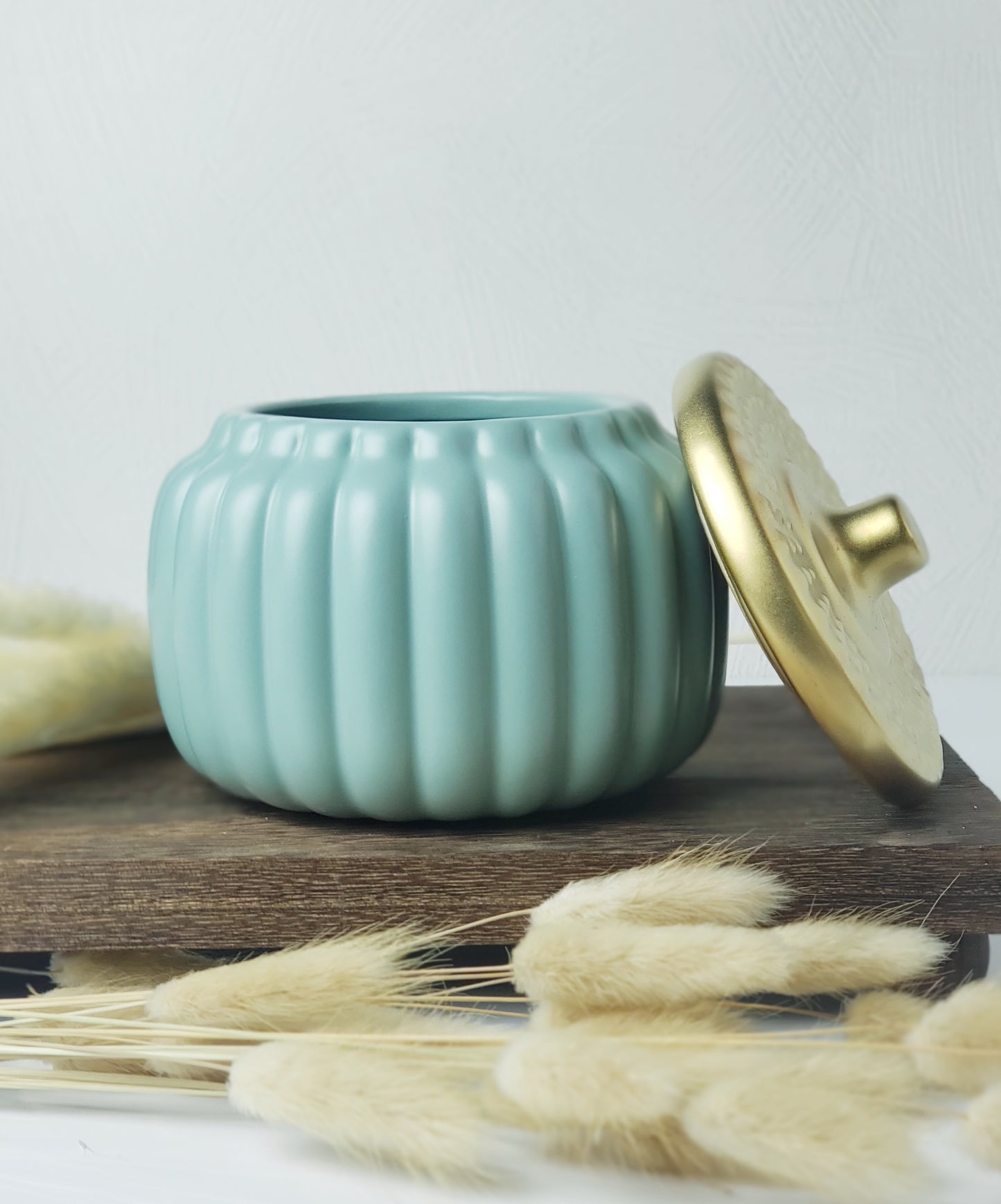 18 ounce teal, cream, and orange pumpkin candles