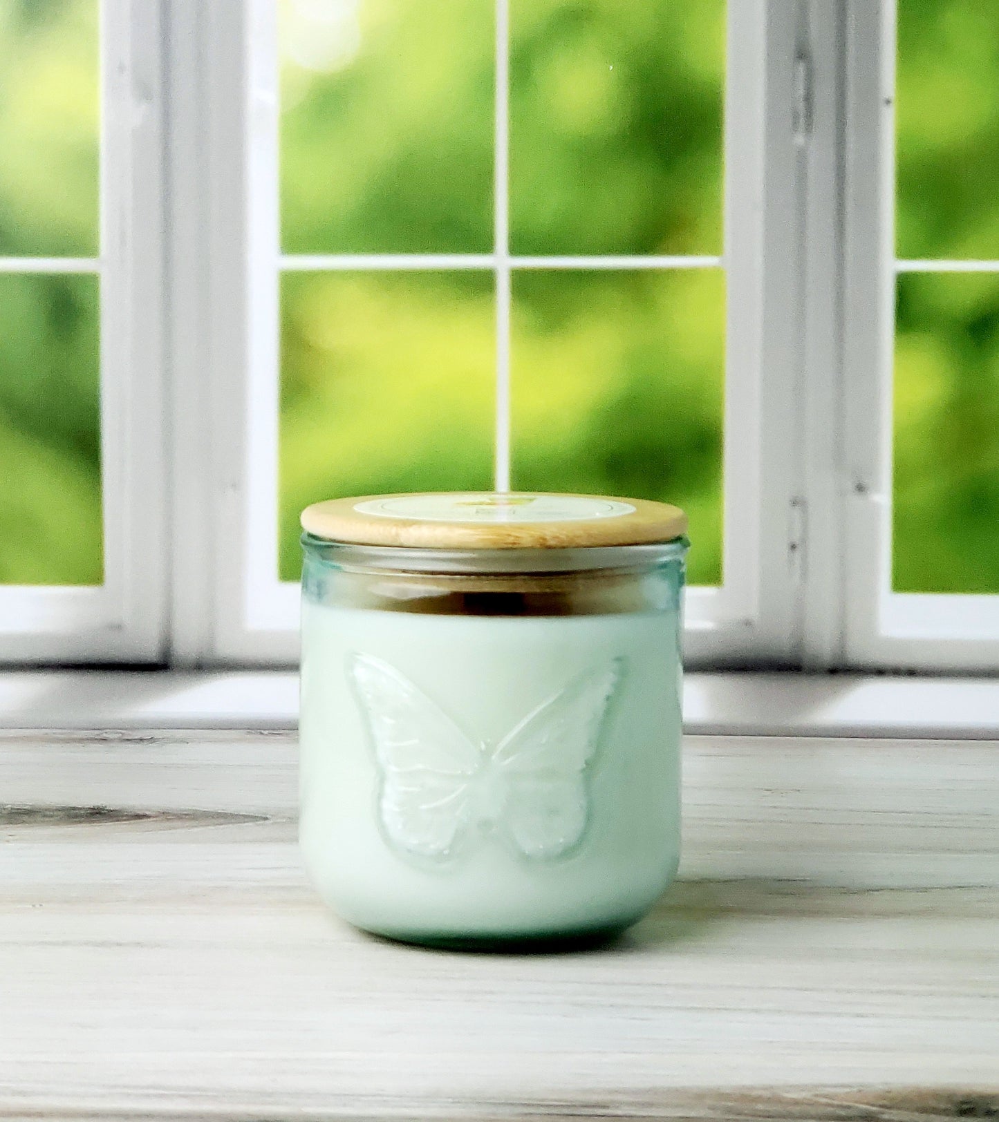 Hinoki & Lily 10 oz wood wick candle in recycled glass with wood lid