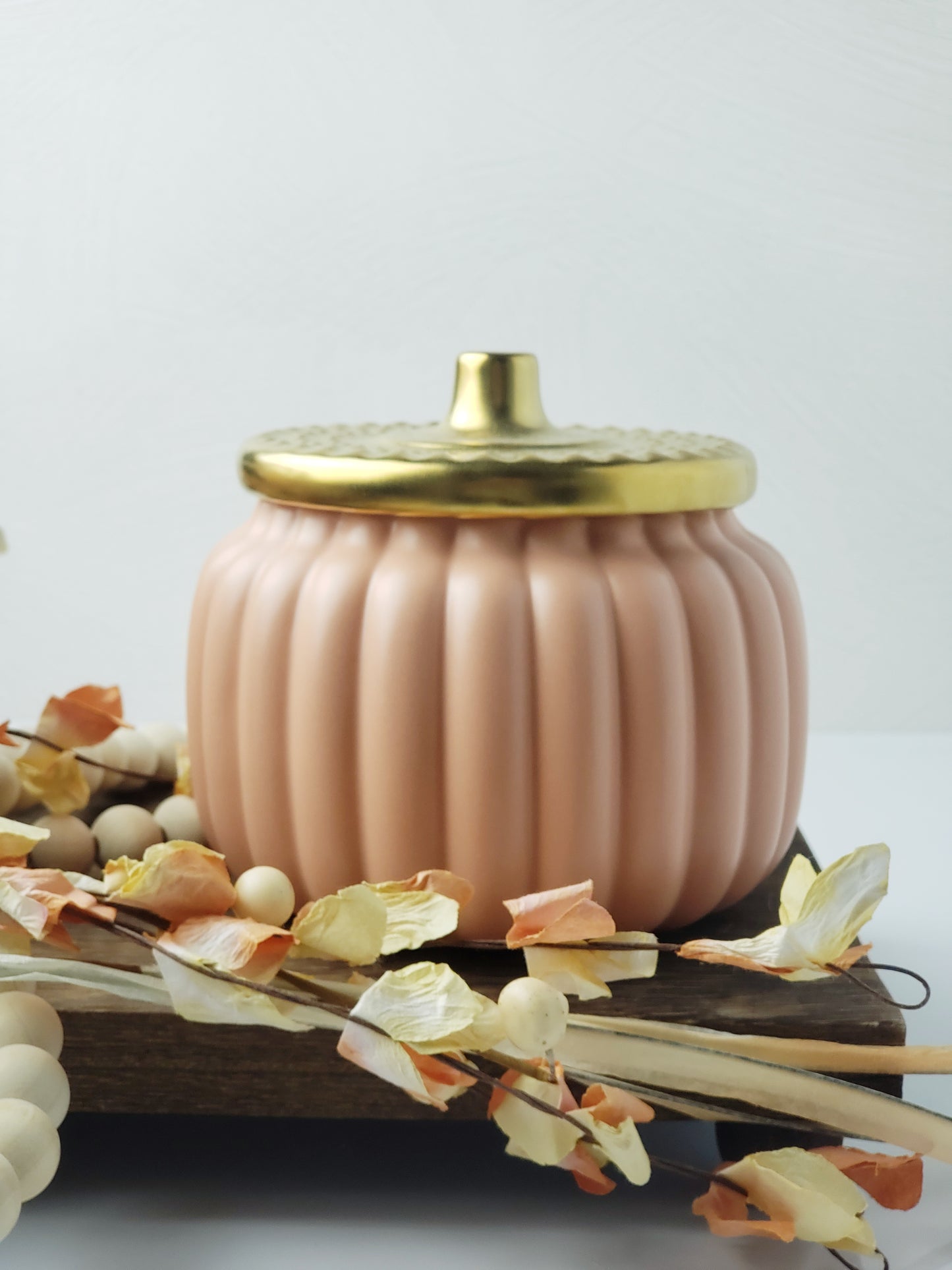 18oz Autumn Harvest candle in light orange pumpkin