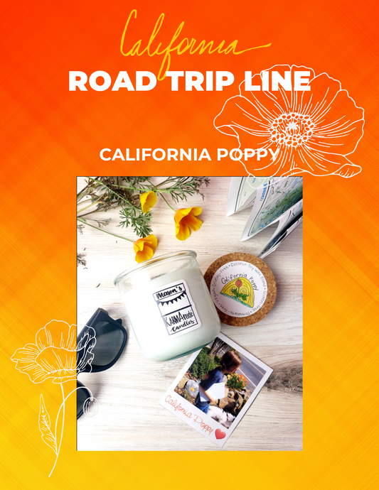 Photo of California Poppy Karmatude candle in clear glass jar with cork lid surrounded by golden poppies, map, sunglasses, and photos of boy walking a dog.