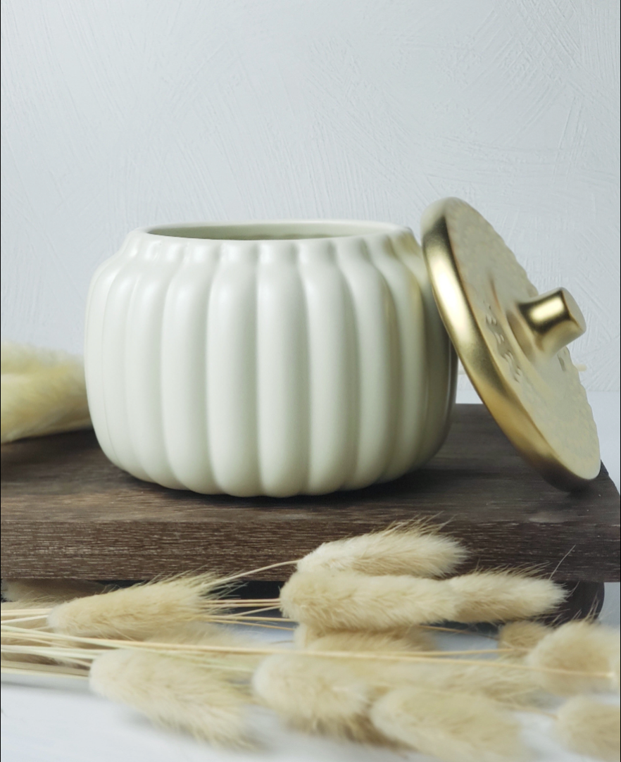 18oz Pumpkin Caramel Crunch candle in cream pumpkin